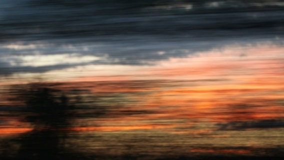 Sonnenuntergang bei Tempo 100. © Gretel Rüping Foto: Gretel Rüping