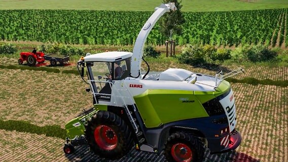 Screenshot aus dem Computerspiel Landwirtschaftssimulator. Auf einem Feld fahren ein roter Porsche-Trecker und ein grüner Mähdrescher.  