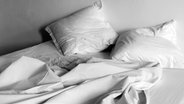 Zerwühlte Bettwäsche. © Fotolia.com Foto: rdnzl
