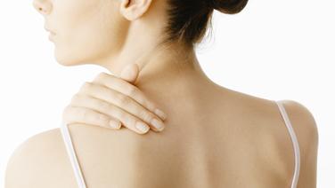 A woman is holding her bare stomach. A woman is holding her bare stomach. © Colourbox