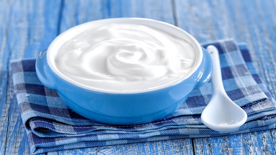 Natural yoghurt in a blue bowl © fotolia Photo: ji_images