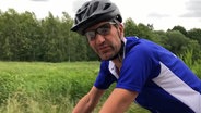 Christian Stichler auf dem Fahrrad © NDR 