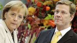 Angela Merkel (CDU) und Guido Westerwelle (FDP) bei den Koalitionsverhandlungen in Berlin © dpa Foto: Hannibal Hanschke