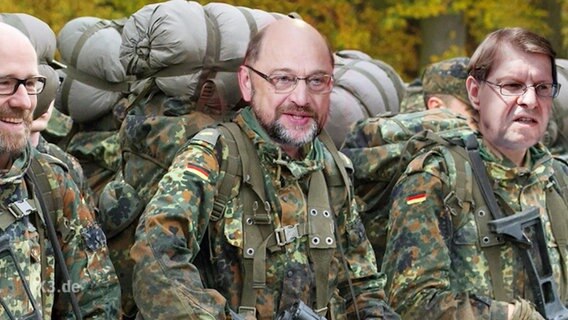 Die Köpfe von Peter Tauber, Martin Schulz und Ralf Stegner sind auf die Körper von Soldaten montiert.  