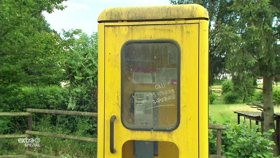Einer alte Telefonzelle.  