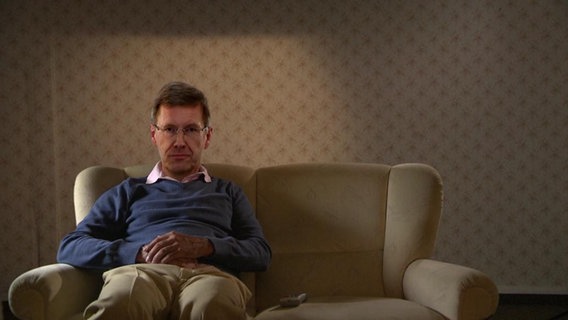 Christian Wulff auf einem Sofa (Bildmontage)  