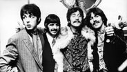 Die britische Band The Beatles mit (l-r) Paul McCartney, Ringo Starr, John Lennon und George Harrison. Undatierte Aufnahme. © picture-alliance / dpa 