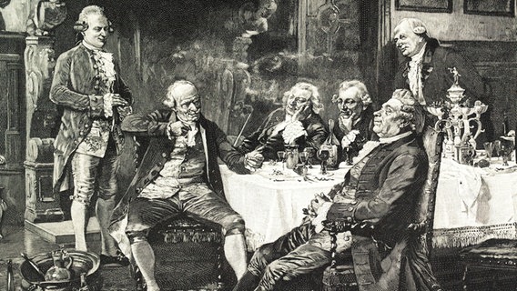Historische Illustration des Barons von Münchhausen beim Erzählen seiner Anekdoten © picture alliance  / akg-images 