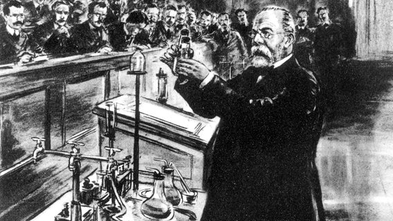 Robert Koch gibt auf einer Sitzung der Physiologischen Gesellschaft am 24. März 1882 in Berlin seine Entdeckung des Tuberkelbazillus bekannt. (Zeichnung von Theo Matejko, 1939) © picture-alliance / akg-images Foto: akg-images