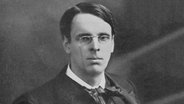 Der irische Dichter William Butler Yeats (1865-1939) als junger Mann, nach einem Foto von Elliott and Fry. © picture alliance / Bildagentur-online | U.I.G. 