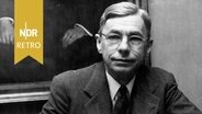Chemiker James Bryant Conant, ehemaliger Präsident der Harvard University und erster Botschafter der Vereinigten Staaten in Westdeutschland an seinem Schreibtisch, 1957 © IMAGO / United Archives International 