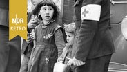 Mitarbeiter des DRK betreuen ungarische Flüchtlingskinder, 1956. © IMAGO / TT 