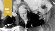 Bundeskanzler Ludwig Erhard spricht zu den verschütteten Bergleuten, 06.11.1963. © Imago Images/ United Archives International 
