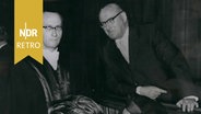 Ferdinand Schörner (hinten rechts) mit seinen Anwälten vor dem Landgericht München, Oktober 1957. © Imago Images/ZUMA/Keystone 