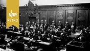 Die Hauptangeklagten während des Prozesses vor dem Internationalen Militärgerichtshof in Nürnberg, davor sitzen die Verteidiger (Ausschnitt). © IMAGO IMAGES / United Archives International 