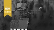 Luftaufnahme einer überfluteten Landschaft zur Zeit der Flutkatastrophe in Norddeutschland, Februar 1962. © NDR Archiv Screenshot 
