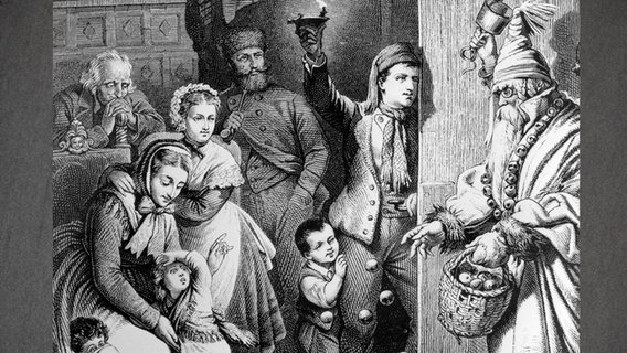 Sankt Nikolaus bei einer Bauernfamilie, Holzstich aus der zweiten Hälfte des 19. Jahrhunderts. © picture alliance / akg-images 