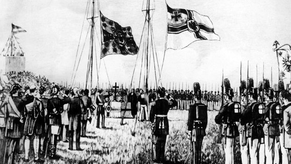 Auf Helgoland wird am 10.08.1890 im Beisein von Kaiser Wilhelm II. die deutsche Flagge gehisst. © picture alliance 