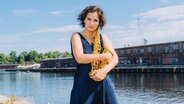 Saxofonistin Asya Fateyeva im Porträt © Jewgeni Roppel Foto: Jewgeni Roppel