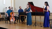 Die vier Musiker und Musikerinnen des Nari Baroque Ensembles stehen auf einer Bühne und spielen. © Internationale Händel-Festspiele Göttingen 