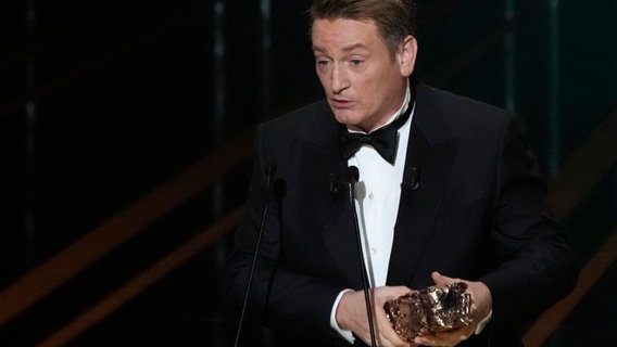Benoît Magimel speaks after winning Best Actor for the film "Pacification - Tournament sur les Iles" During the 48th Cesar Awards. Photo: Christophe Ena / AP / dpa +++ dpa picture radio +++ © Christophe Ena / AP / dpa +++ dpa picture radio +++ Photo: Christophe Ena