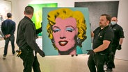 "Shot Sage Blue Marilyn" von Andy Warhol im Auktionshaus Christie's © Ted Shaffrey/AP/dpa +++ dpa-Bildfunkelillo Foto: Ted Shaffrey