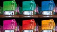 Ein Gebäude, was in unterschiedlichen Farben angestrahlt wird. © Urs Müller Foto: Urs Müller
