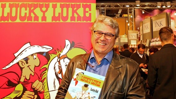 Der Lucky-Luke-Zeichner Achdé 2012 auf der Frankfurter Buchmesse. © picture alliance / dpa 