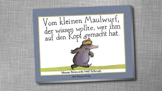 Das Buchcover "Vom kleinen Maulwurf, der wissen wollte, wer ihm auf den Kopf gemacht hat." © Peter Hammer Verlag Foto: Illustrator: Wolf Erlbruch