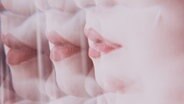 Die Lippen einer Frau in einer psychedelischen Verzerrung. © photocase | nanihta Foto: nanihta