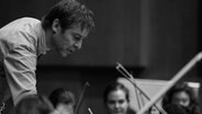 Dirigent Stefan Geiger während einer Probe mit dem NDR Jugendsinfonieorchester © Paul Schirnhofer Foto: Paul Schirnhofer