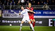 Zweikampf zwischen Marvin Pourie vom SV Meppen (l.) und Michael Schulz (FC Viktoria Koeln. © Imago images / Beautiful Sports 