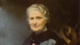 Ein Porträtgemälde zeigt Maria Montessori. Ein Porträtgemälde zeigt Maria Montessori. © Nienhuis Montessori International