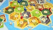 Das Bild zeigt das Brettspiel "Die Siedler von Catan" © picture-alliance / dpa Foto: Patrick Seeger