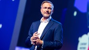 Bundesfinanzminister Christian Lindner bei einem Auftritt auf der Messe OMR in Hamburg. © picture alliance / dpa Foto: Daniel Bockwoldt