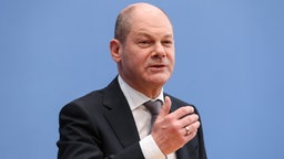 Olaf Scholz auf einer Pressekonferenz in Berlin Olaf Scholz auf einer Pressekonferenz in Berlin © picture alliance/ZUMA Press