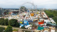 Blick aus der Luft aus das Heiligengeistfeld am ersten Tag des Sommerdoms 2024. © Markus Scholz/dpa 