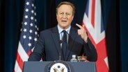 Der britische Außenminister David Cameron bei einer Pressekonferenz in den USA © AP/dpa Foto: Kevin Wolf/FR33460
