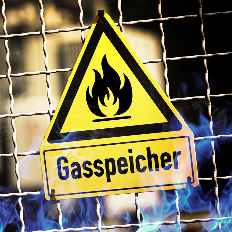 Schild mit einer Gasflamme und der Aufschrift "Gasspeicher" an einem Gitter - Fotomontage © picture alliance / Bildagentur-online | Bildagentur-online 
