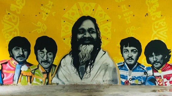 Malerei an der Wand in einem ehemaligen Beatles-Ashram in Indien. © Silke Dittrich 