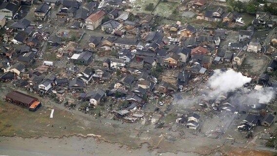 Küstengebiet in Suzu in der zentraljapanischen Präfektur Ishikawa, das offenbar durch einen Tsunami beschädigt wurde. © Uncredited/kyodo/dpa 