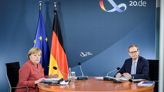 Bundeskanzlerin Angela Merkel und Berlins Regierender Bürgermeister Michael Müller © dpa-Bildfunk Foto: Jesco Denzel/Bundespresseamt/dpa