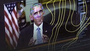 Bild aus einem gefälschten Video mit dem ehemaligen Präsidenten Barack Obama. Es zeigt Elemente der Gesichtserkennung, die in einer neuen Technologie verwendet werden, die es jedem ermöglicht, Videos zu erstellen, in denen echte Menschen scheinbar Dinge sagen, die sie nie gesagt haben. © picture alliance 