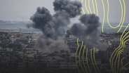 Rauch steigt nach israelischen Luftangriffen auf. © picture alliance Foto: Hatem Moussa