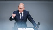 Bundeskanzler Olaf Scholz spricht in der Generaldebatte des Bundestags. © picture alliance Foto: Kay Nietfeld