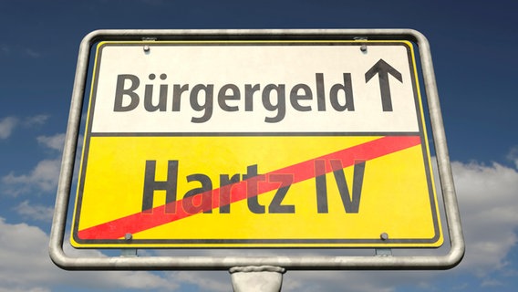 Ein Schild zeigt "Hartz IV" durchgestrichen, darüber steht "Bürgergeld" (Bildollage). © Zoonar  DesignIt Foto: Zoonar  DesignIt
