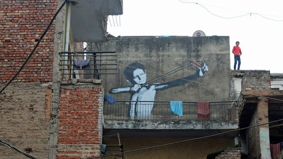 Streetart an einer Häuserwand © NDR Info 