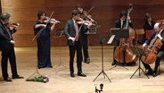 Die Musikerinnen und Musiker des Jewish Chamber Orchestra beim Konzert. © Jewish Chamber Orchestra Hamburg Foto: Sergey Gunstein