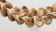 Ein geflochtener Haar-Zopf © COLOURBOX Foto: -
