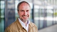 Ein Porträtbild zeigt Thomas Breuer von "Greenpeace". © privat 